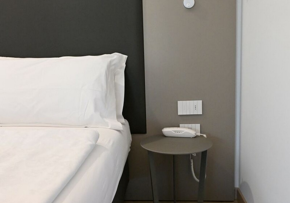 Suite Familiare Deluxe | Spaziosa suite familiare con vista sulle montagne, pensata per regalare comfort e serenità a tutta la famiglia.